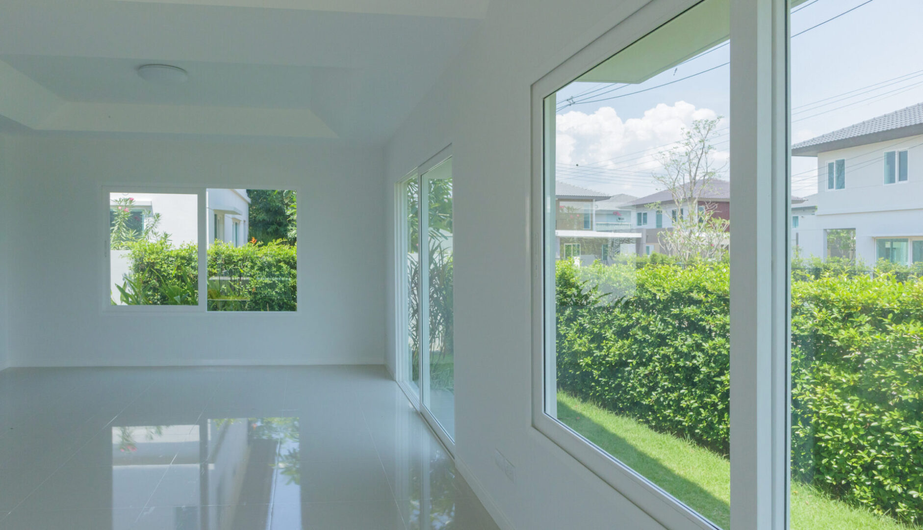 Empty room with large windows